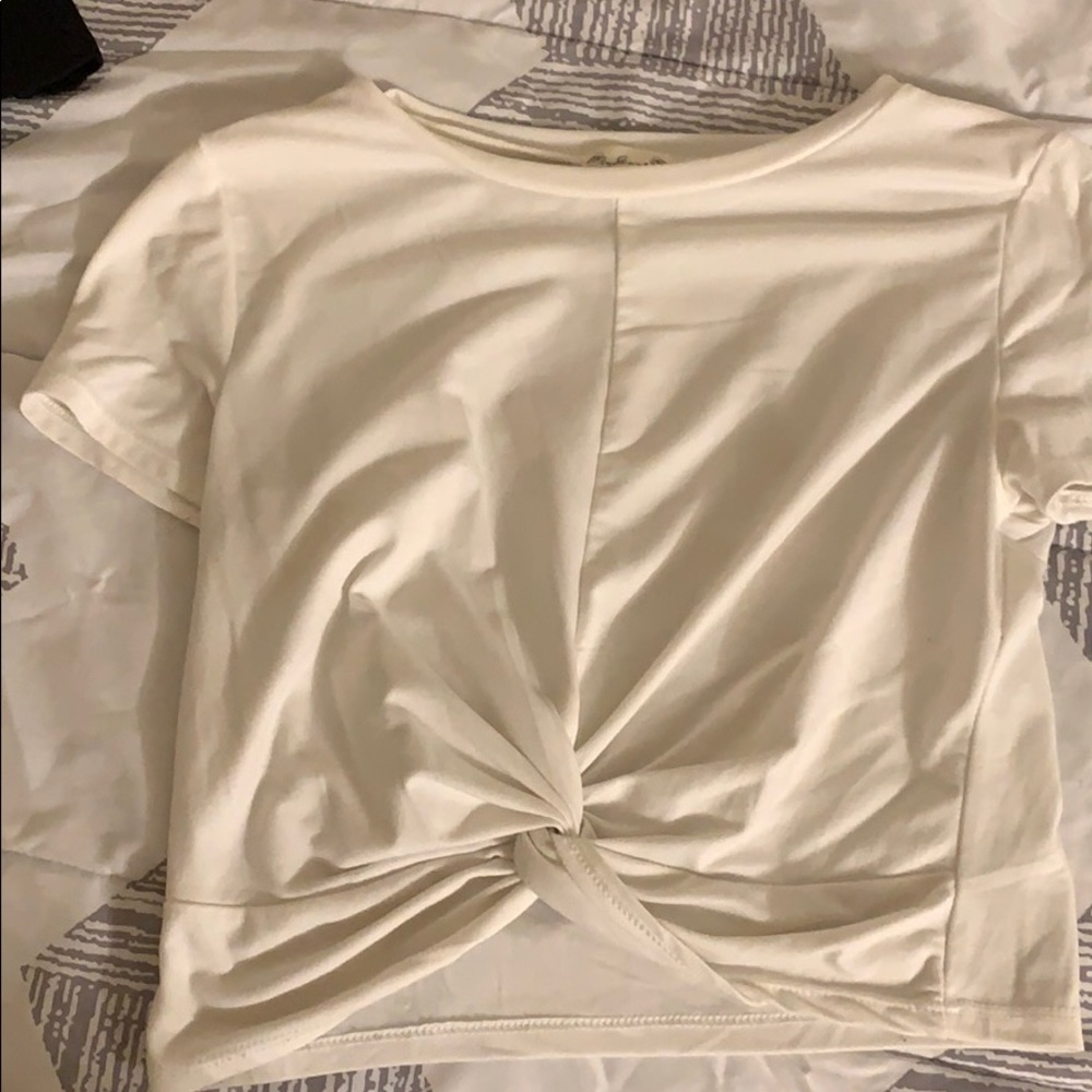 White top with twist front